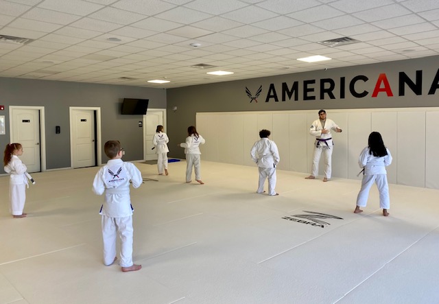 Kids lined up for Jiu Jitsu class