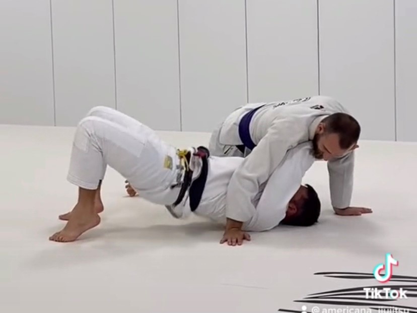 side control escape into an armbar